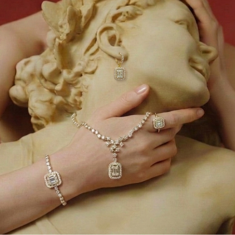 Person wearing diamond jewelry on a classical sculpture background